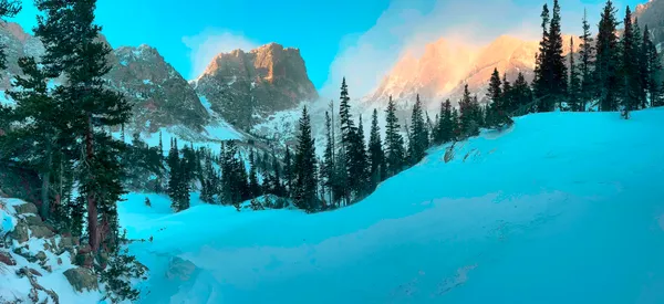 Rocky Mountain National Park Sign on a sunny day with clear sky overhead
